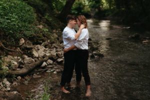 Couple in Creek - Wedding at Finley Farms