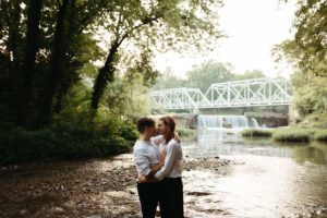 Couple in Creek - Weddings at Finley Farms