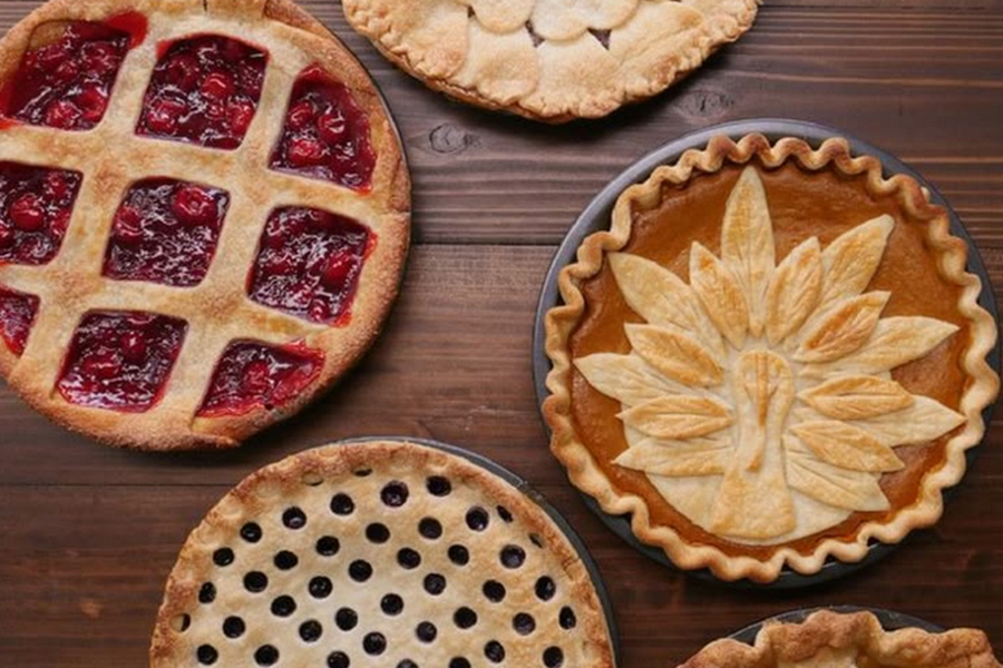 ff_pie_workshop_900x600 various holiday pies with intricate lacing lay upon a table